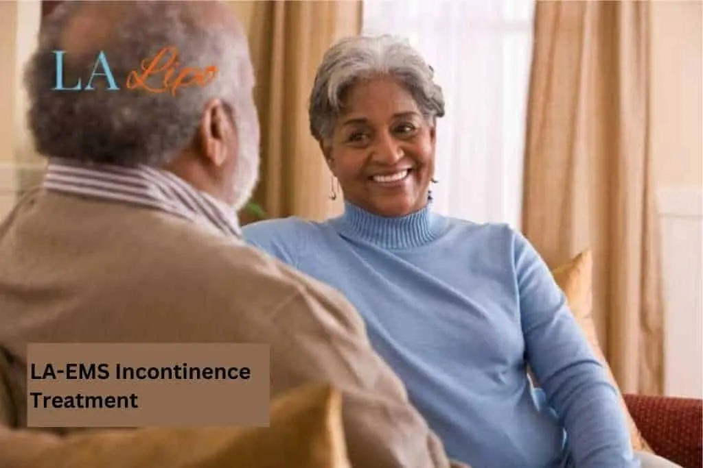 Couple sat smiling at each other - LA-EMS treatment Cambridgeshire