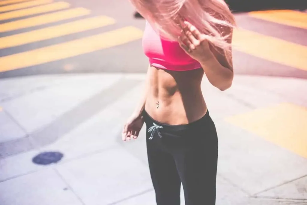 Woman with toned stomach after LA-EMS Body Sculpting Treatment Cambridgeshire